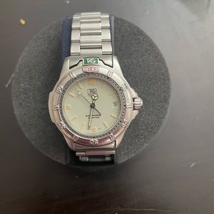 Tag Heuer. Sapphire crystal. Water resistant. Very good condition.